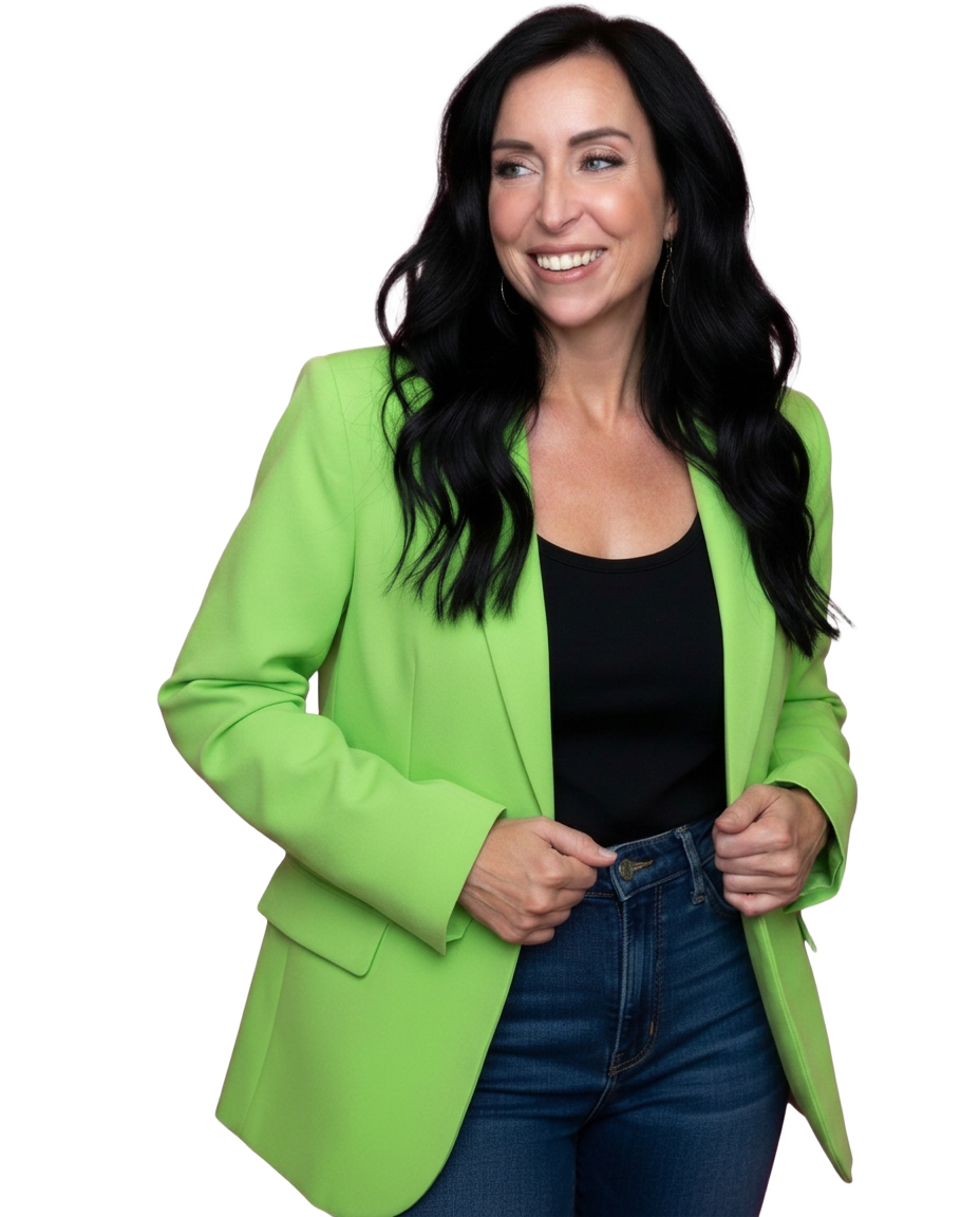 Founder of The Sales Playbook in a lime green blazer